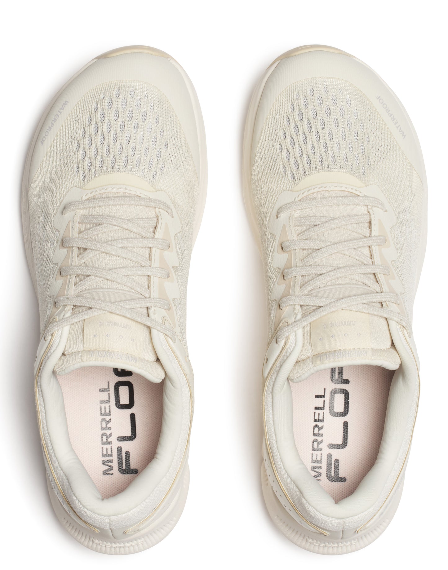 Overhead shot of two off-white sneakers with mesh uppers and visible "MERRELL FLOA" text on the inner sole.