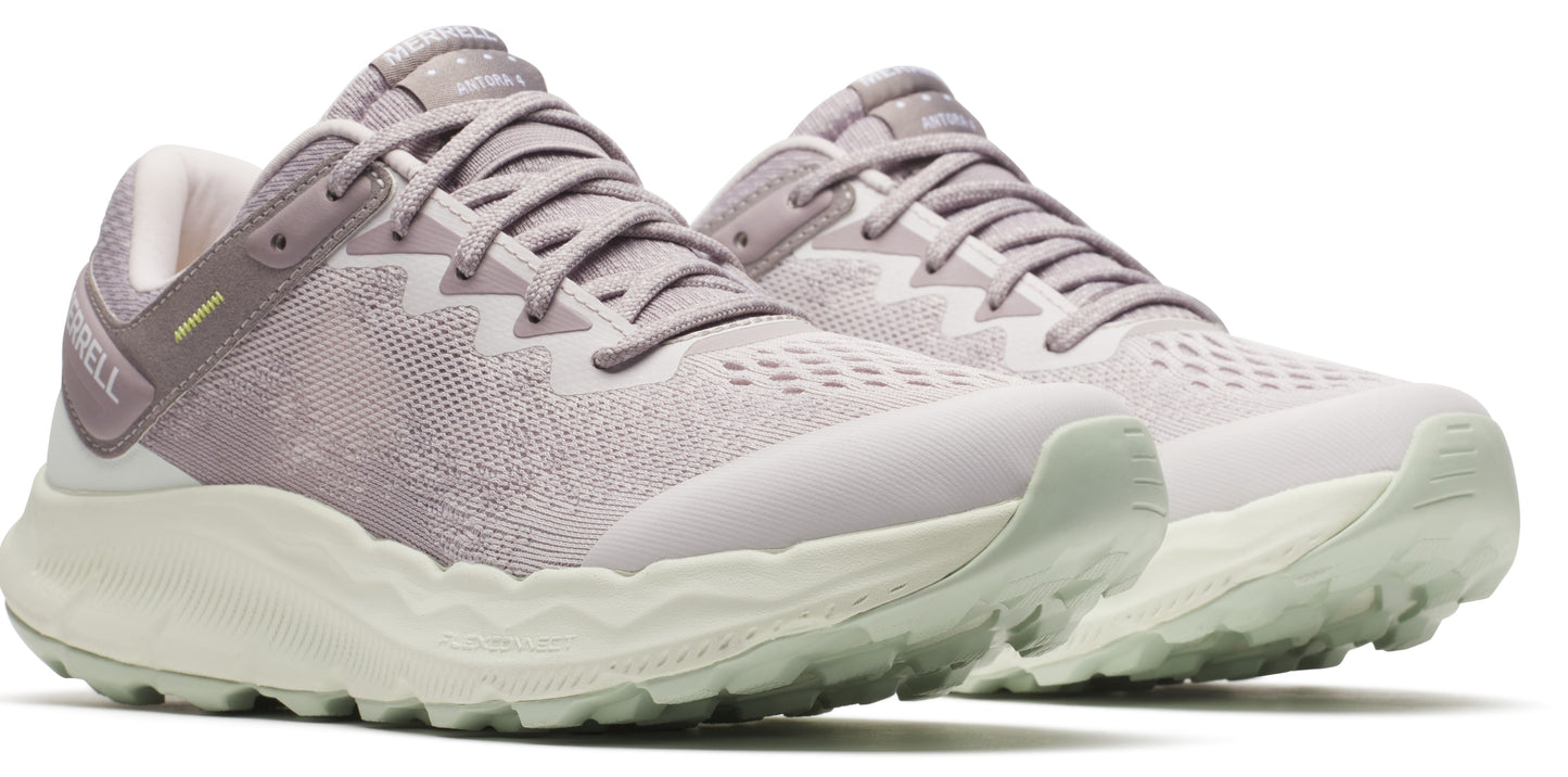 A pair of lavender running shoes with cream-colored soles.