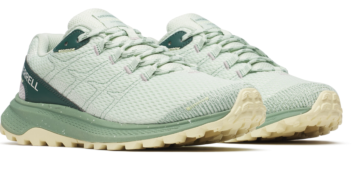 A pair of light-green running shoes, seen at an angle with their laces tied and chunky soles visible.