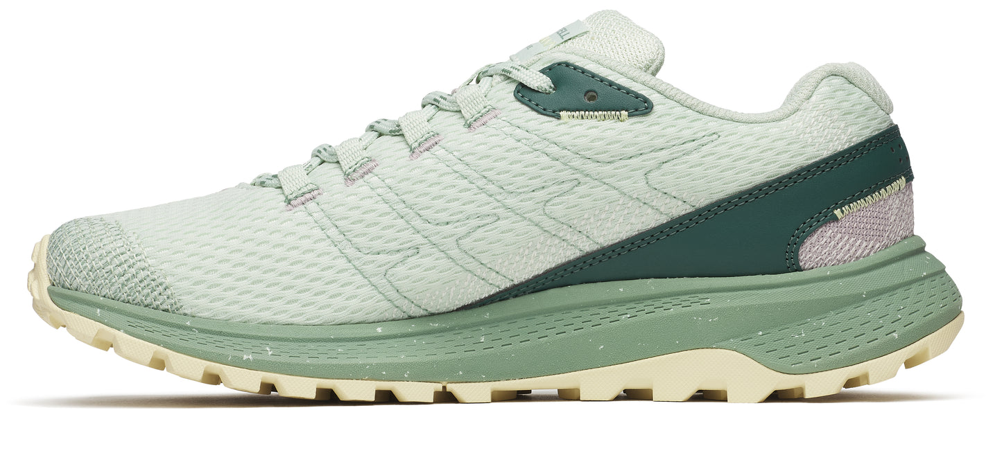 Athletic shoe in light green with dark green heel.