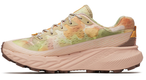 Trail running shoe with beige platform sole, and light yellow, beige, and olive tie-dye upper.