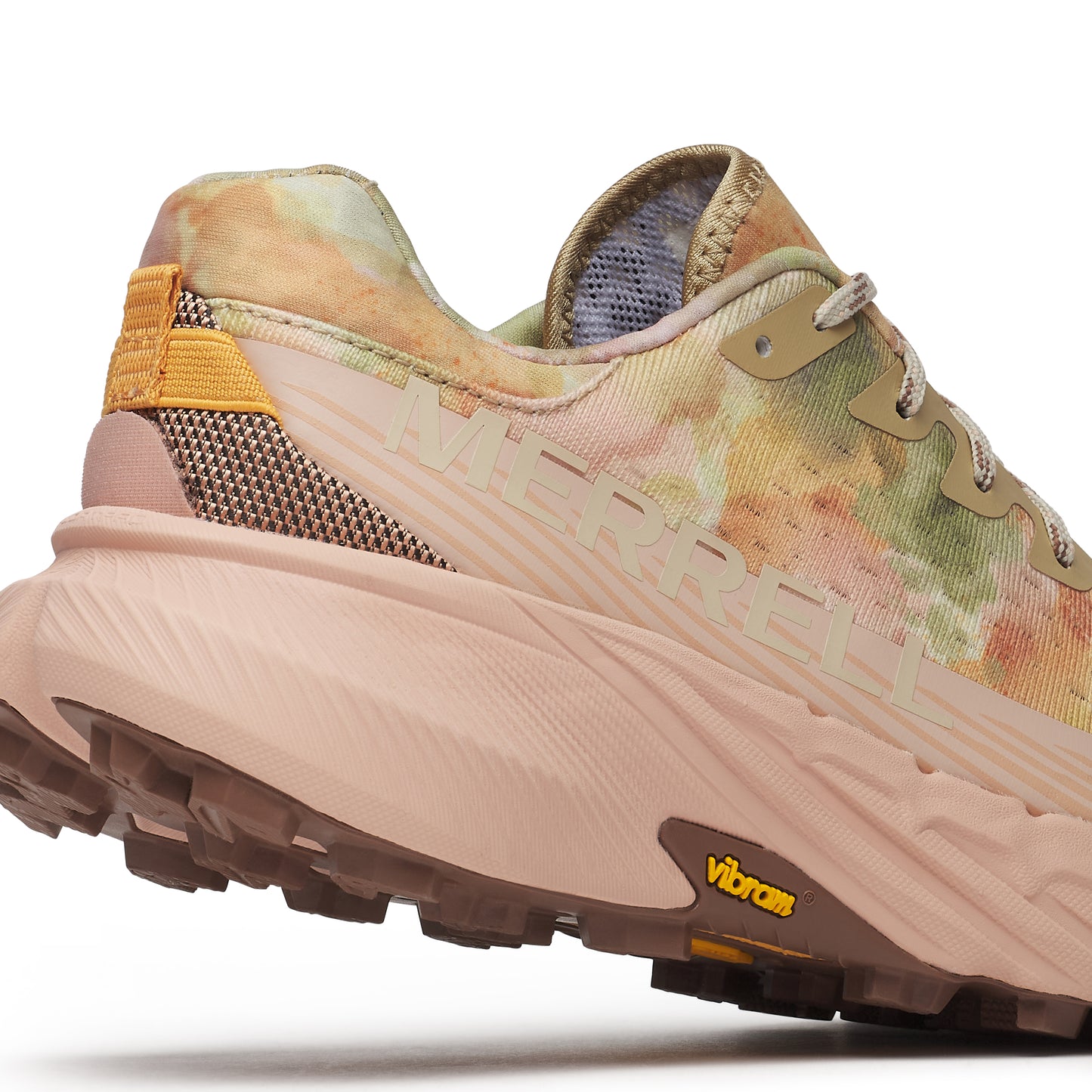 Tie-dye low-top athletic shoe with a beige sole.