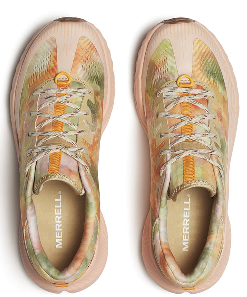 Two running shoes showing uppers with a tie dye pattern, patterned laces, and the word "MERRELL" on the insole.