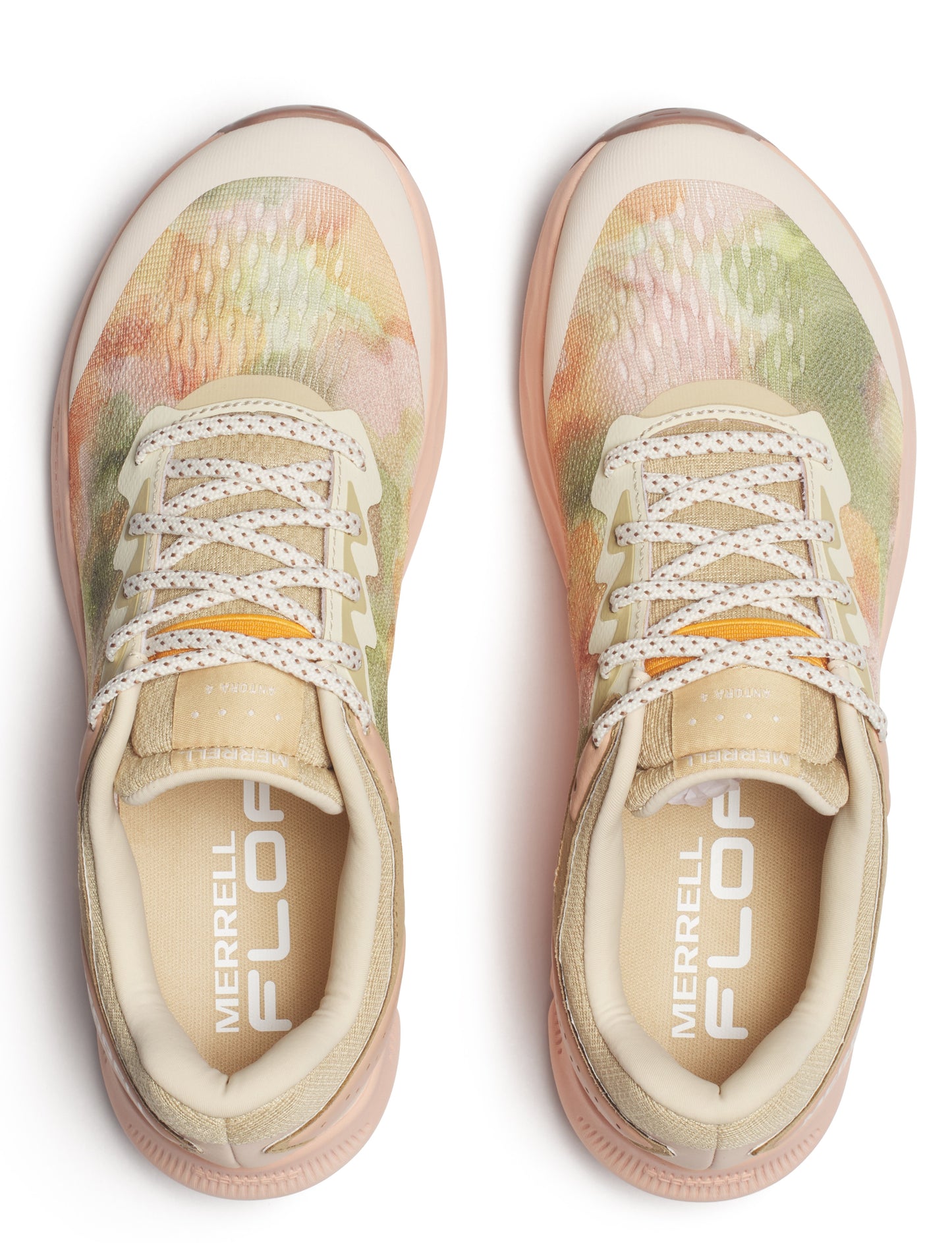 Top view of two floral patterned tan sneakers with patterned laces and ‘MERRELL FLOA’ printed inside.