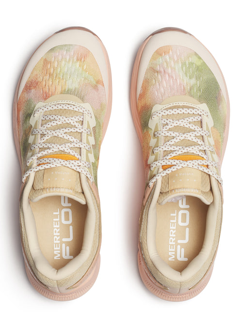 Top view of two floral patterned tan sneakers with patterned laces and ‘MERRELL FLOA’ printed inside.