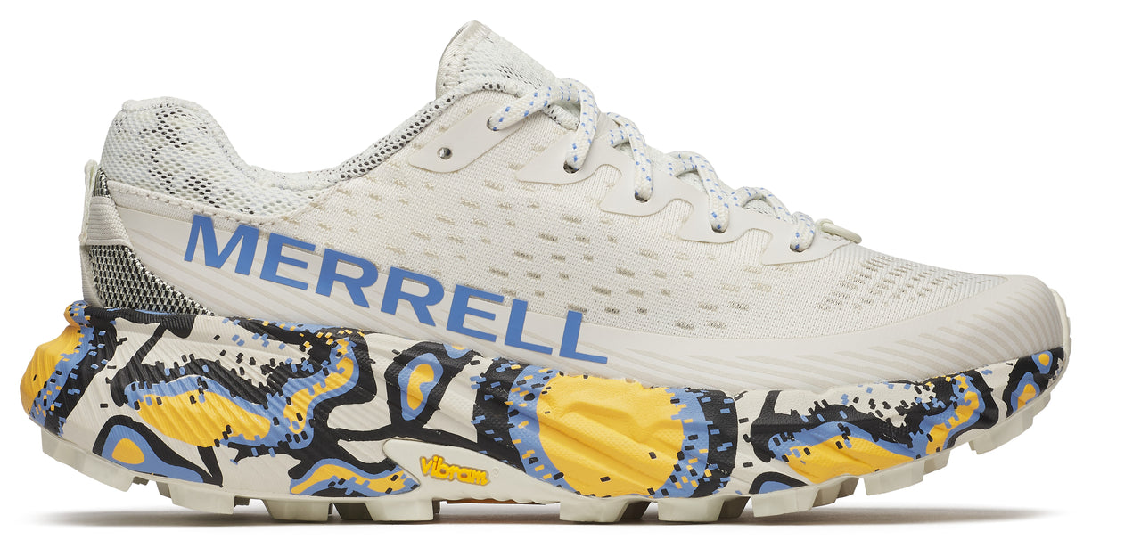 A light-colored running shoe with a patterned sole and blue "MERRELL" lettering.
