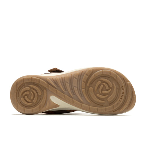 The sole of a tan sandal is visible, featuring a swirling tread pattern and the word 'MERRELL' along the side.