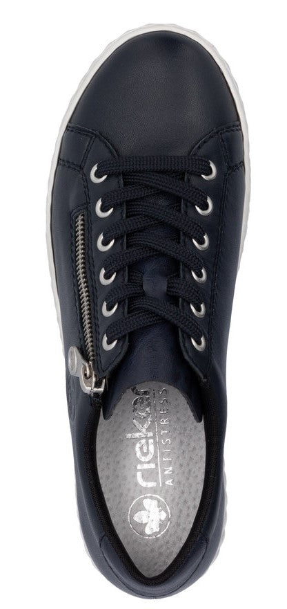 Top-down view of a dark-colored sneaker with white trim and laces, and a side zipper.