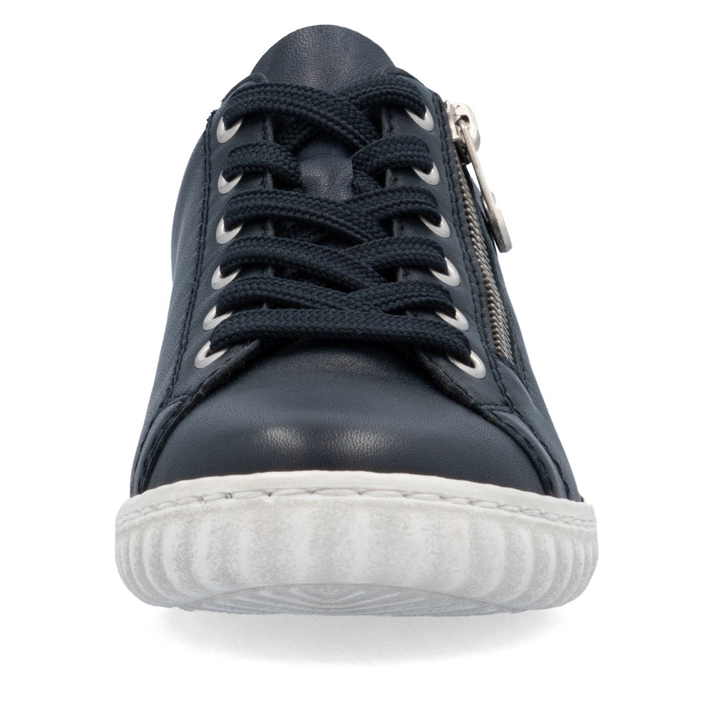 Low-cut navy blue leather sneaker with laces and side zipper on a thick white sole.