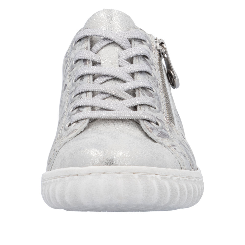 Silver sneaker with side zipper and textured sole.