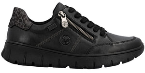 Black shoe with zipper and black laces, and animal print heel.