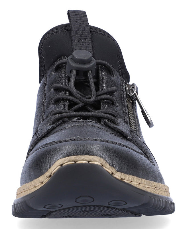 Black leather shoe with toggle laces and side zipper.