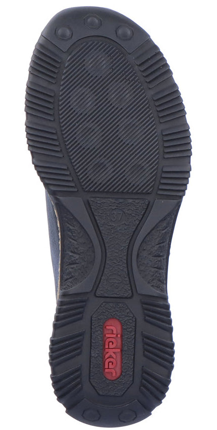 Bottom view of a shoe with a black rubber outsole showing traction patterns and a visible red logo inset.