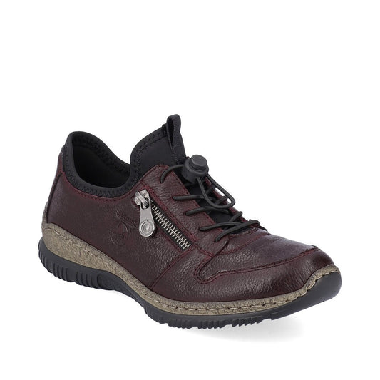 A brown leather sneaker with a zipper and black elastic lacing system.