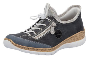 Dark blue casual shoe with faux laces, side zipper, cork trim, and a white sole.