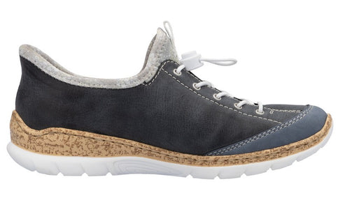 Side view of a gray slip-on shoe with light-colored laces, trim, cork-like midsole, and white outer sole.