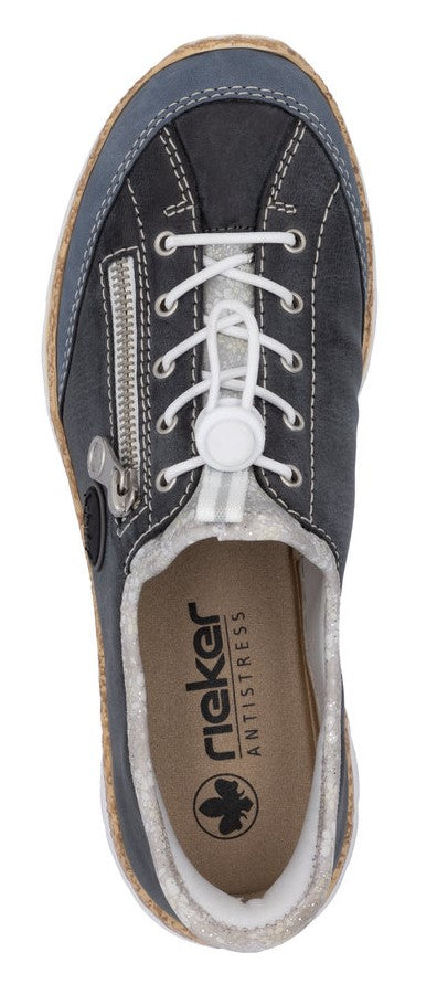 A top-down view of a dark blue sneaker with white laces, a side zipper, and a light-colored interior with the text "rieker ANTISTRESS" visible.