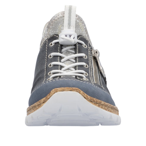 Close-up of gray and silver sneaker with white laces and a side zipper.