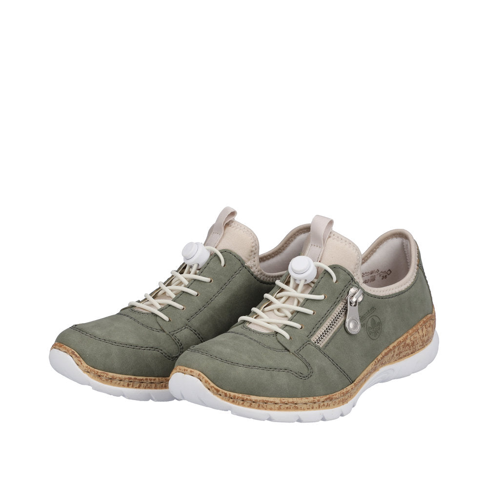 Pair of green sneakers with white soles and laces, one with a side zipper.