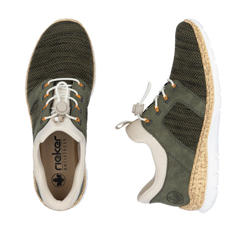Pair of green knit sneakers with beige interior and white laces.
