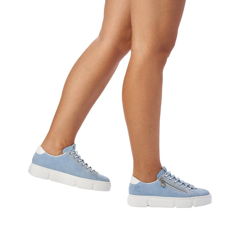 Blue suede low-top sneakers with white soles, silver laces and zipper.