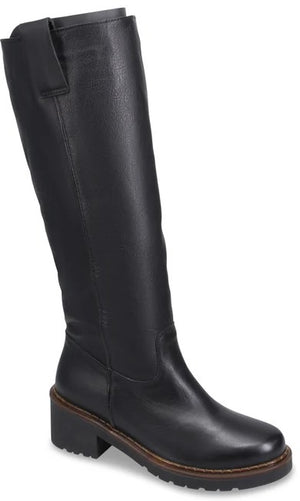 A black, knee-high, pull-on leather boot with a thick lug sole, a low stacked heel, and a subtle seam detail running up the shaft.