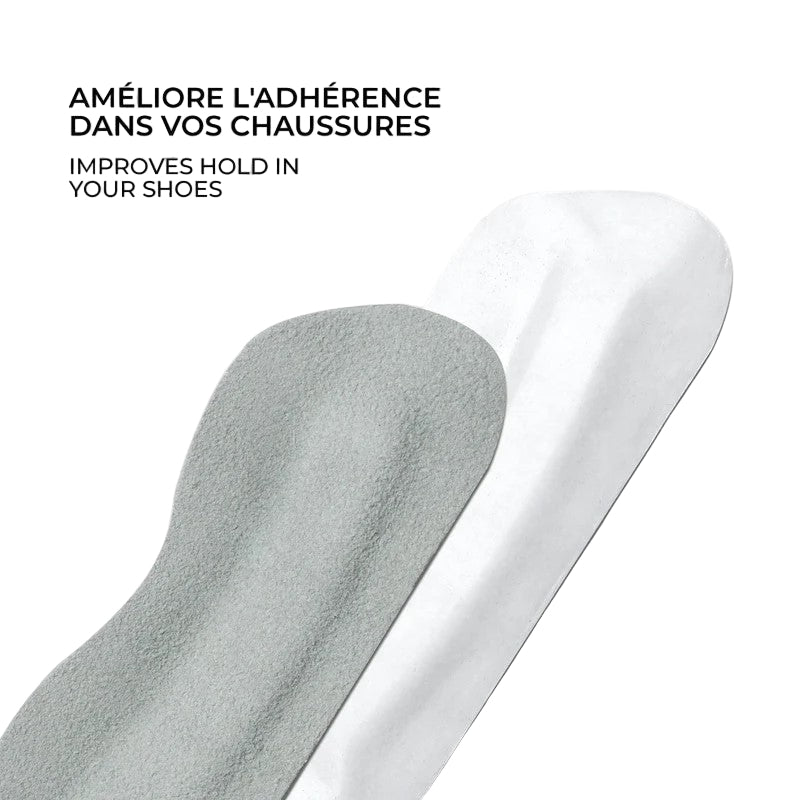 Two shoe inserts, one gray and one white, are positioned side-by-side.