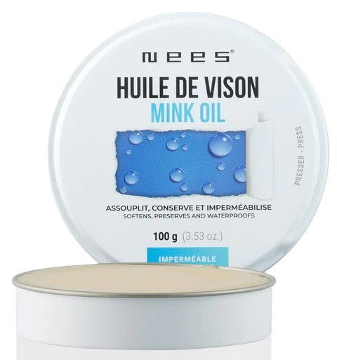 A white tin containing solid oil with text, "Zee5, HUILE DE VISON, MINK OIL, ASSOUPLIT, CONSERVE ET IMPERMÉABILISE, SOFTENS, PRESERVES AND WATERPROOFS, 100 g (3.53 oz.), IMPERMÉABLE, PRESSER-PRESS".