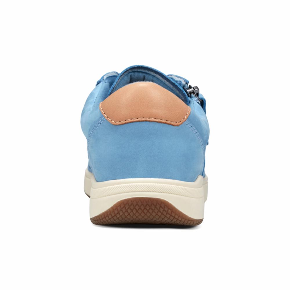 Close-up of a light blue casual sneaker with tan accent on the heel, and a cream sole with brown rubber tread, viewed from the back.