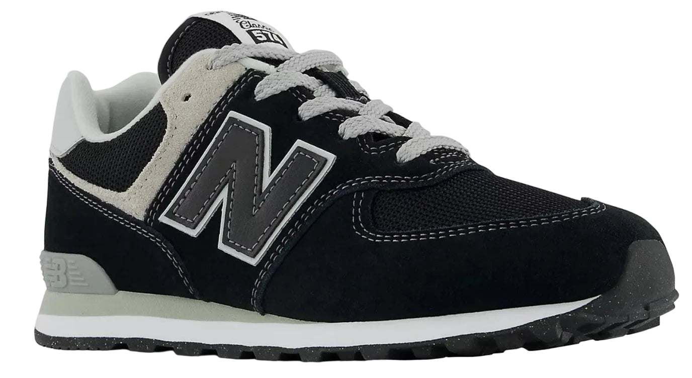 A black shoe with a gray 'N' logo and gray laces.