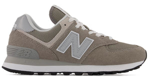A gray suede and mesh sneaker with a large 'N' logo on the side.