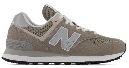 A gray suede and mesh sneaker with a large 'N' logo on the side.