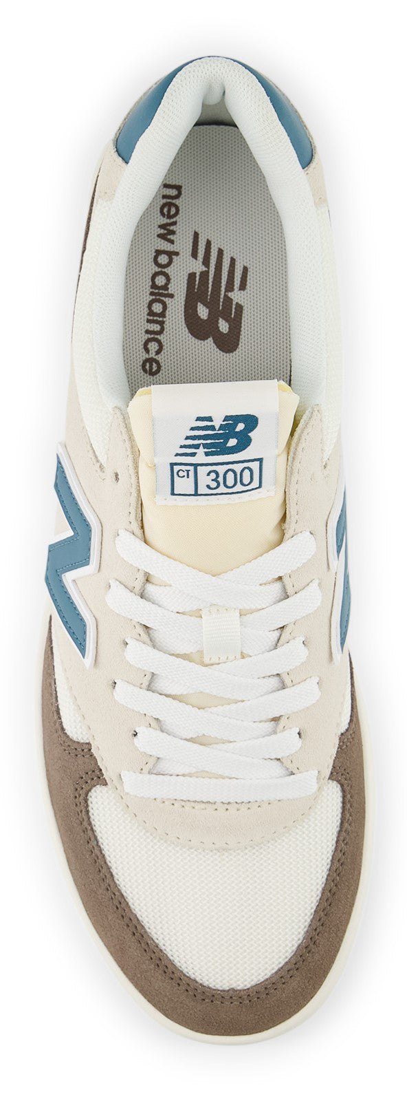 Overhead view of a sneaker with off-white laces and a brown toe. Inside the shoe, the words "new balance" are printed.