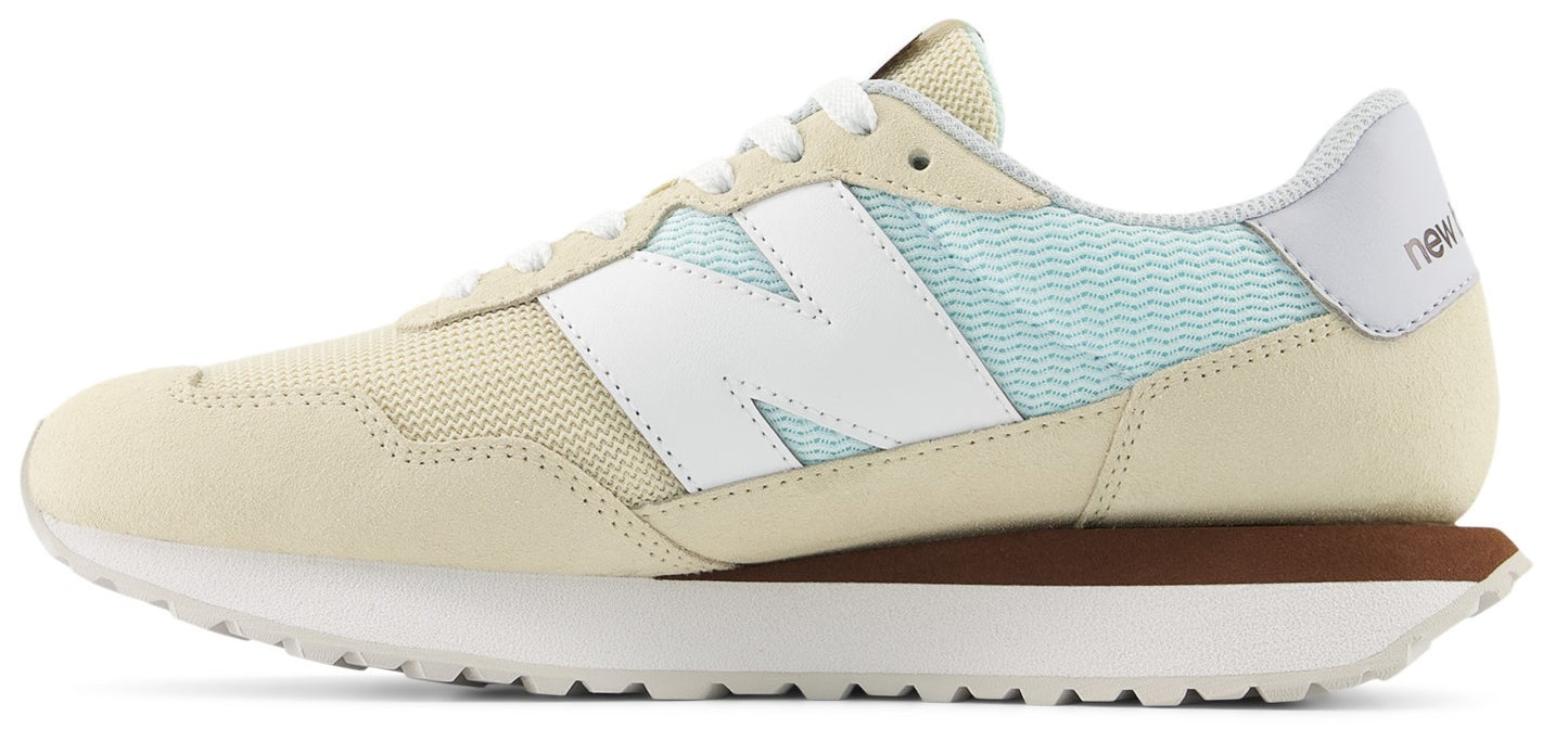 A sneaker with a white "N" on the side.