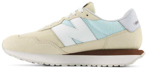 A sneaker with a white "N" on the side.