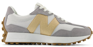 A running shoe with a white and gray upper and brown sole.