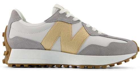 A running shoe with a white and gray upper and brown sole.