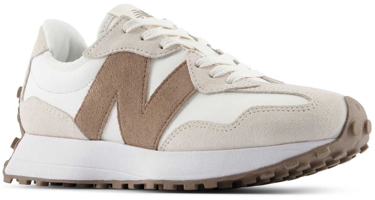 A New Balance 327 sneaker in a beige and white colorway, featuring a white nylon base with light grey suede overlays and a prominent tan suede N logo on the side, set atop a thick white midsole and a textured brown rubber outsole that extends up the heel.