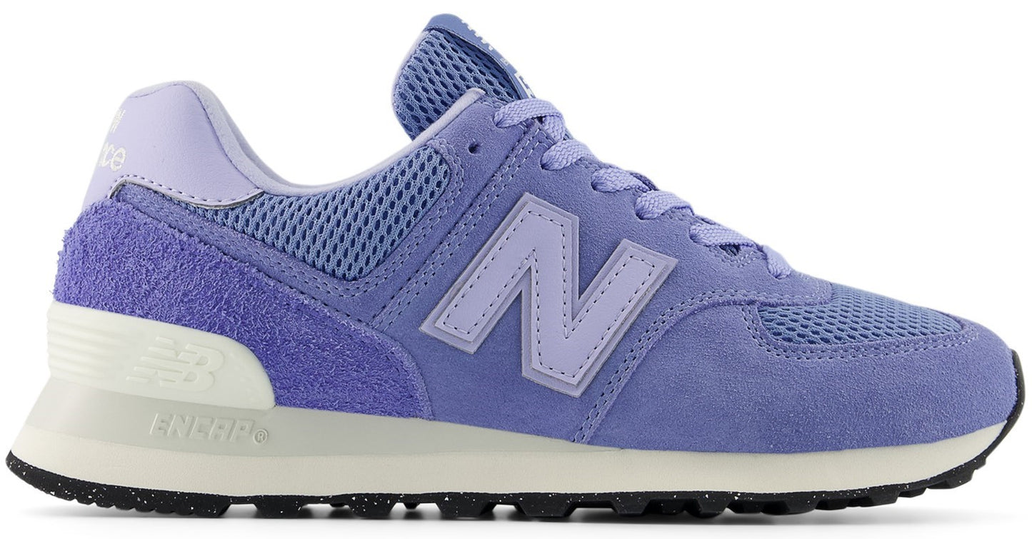 Lavender sneaker with suede overlays, mesh panels, light purple "N" logo, and off-white midsole.