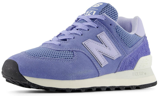 A low-top, light purple suede sneaker with white trim and black outsole.