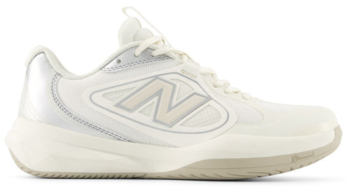 A low-top athletic shoe in shades of off-white and cream, featuring a mesh upper, synthetic overlays, a prominent letter N on the side, a cushioned midsole, and a silver-toned heel tab.