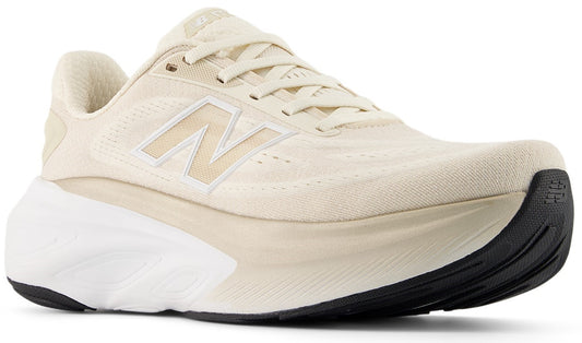 Beige running shoe with thick white and black sole and white 'N' logo.