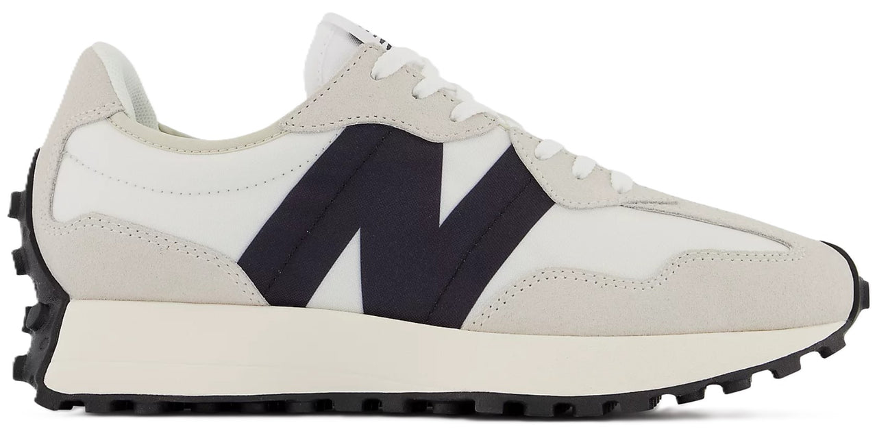 A white sneaker with a black "N" logo on the side.