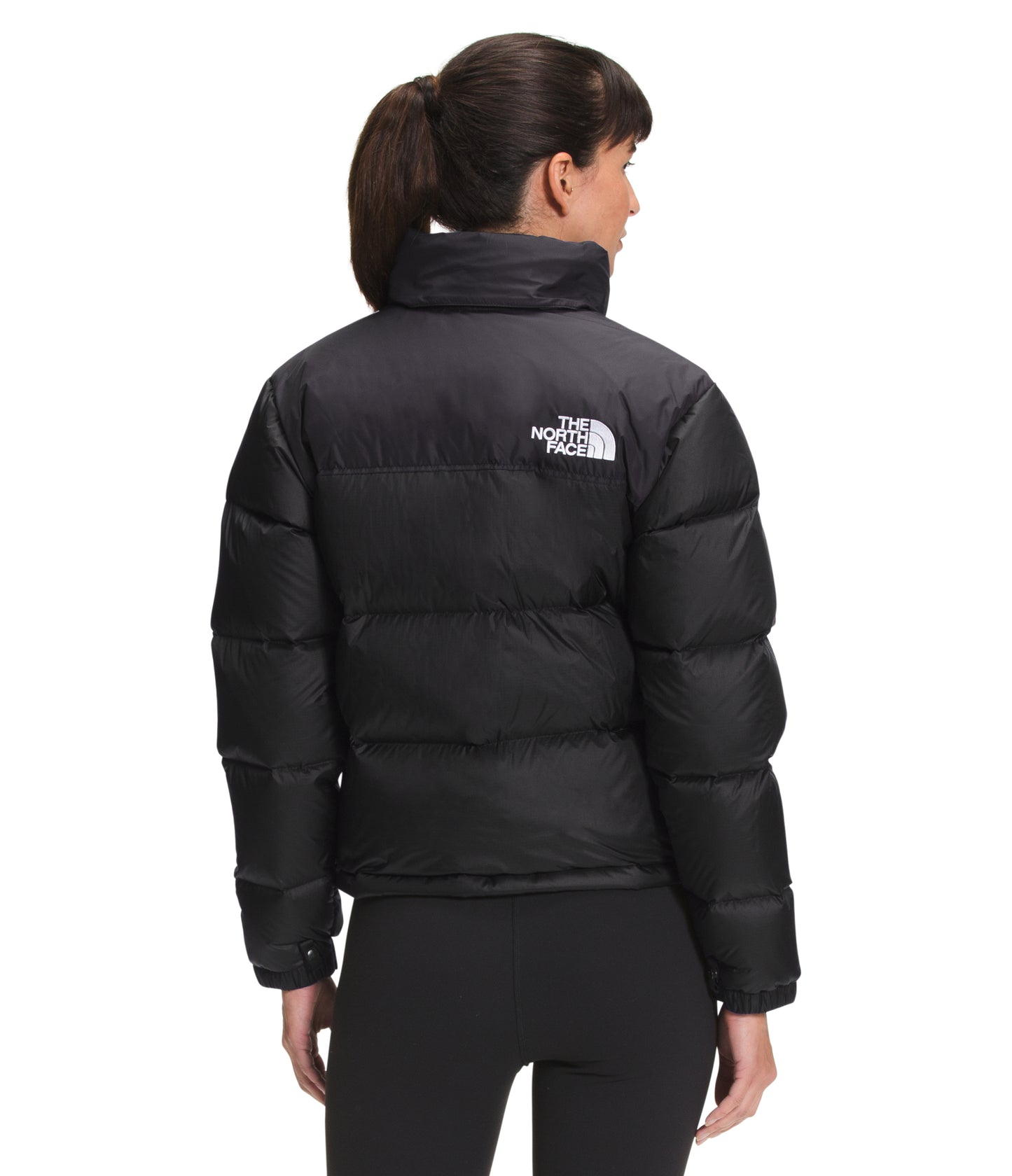 A black puffer jacket with a white logo on the upper back.