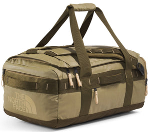 Duffel bag in tan and brown with handles and straps, featuring 'THE NORTH FACE' logo.