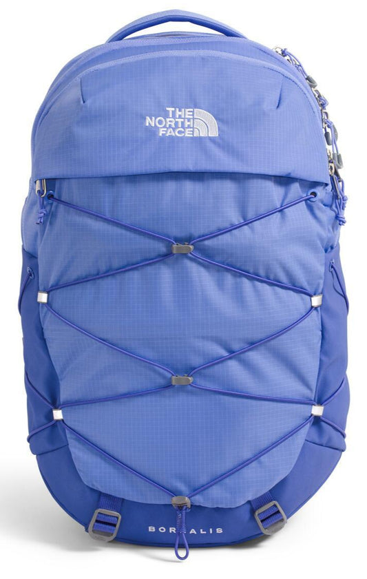 Blue backpack with bungee cord front and white "THE NORTH FACE" text on top flap.