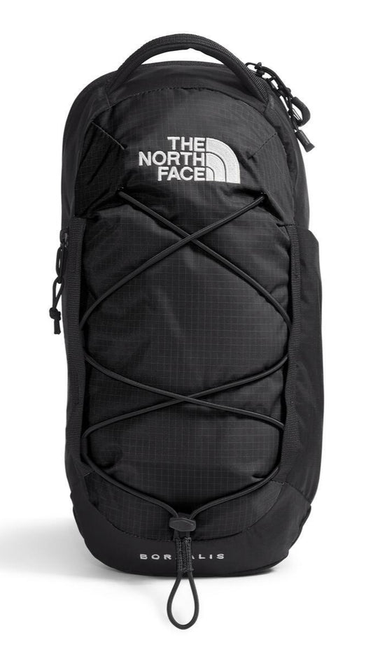 Black backpack with bungee cord crisscross front and the text "THE NORTH FACE" on top.