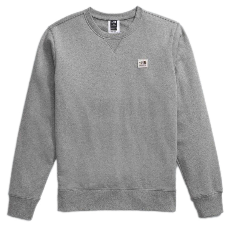 Gray crew neck sweatshirt with logo on the chest and tag on the collar.
