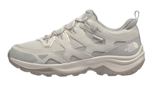 Grey trail running shoe with mesh and synthetic overlays, thick textured sole, and "THE NORTH FACE" printed on the side.