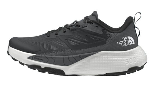 A gray and white running shoe with a thick white sole and "THE NORTH FACE" in white on the side.